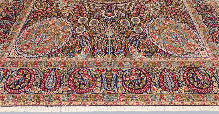 A carpet, Kirman Laver, 'Millefleur', c. 393 x 300 cm.