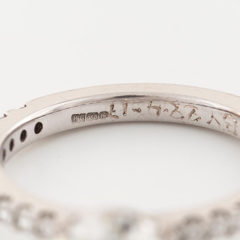 A brilliant cut diamond ring.