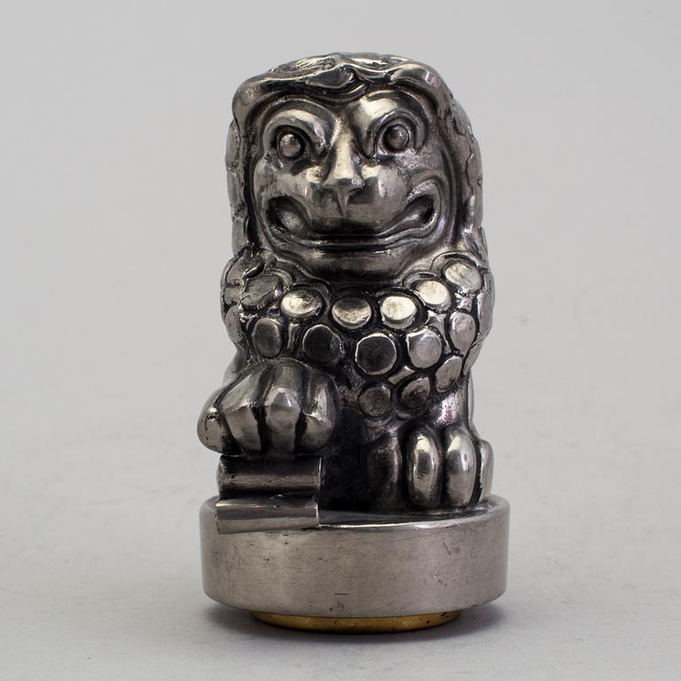ANNA PETRUS, seal stamp with a brass stamp, pewter and brass, Svenskt Tenn, 1981 (year mark blurred).