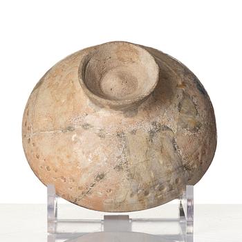 A central Asian pottery bowl,  13th century.