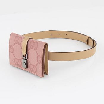 Gucci, a belt with a bag.