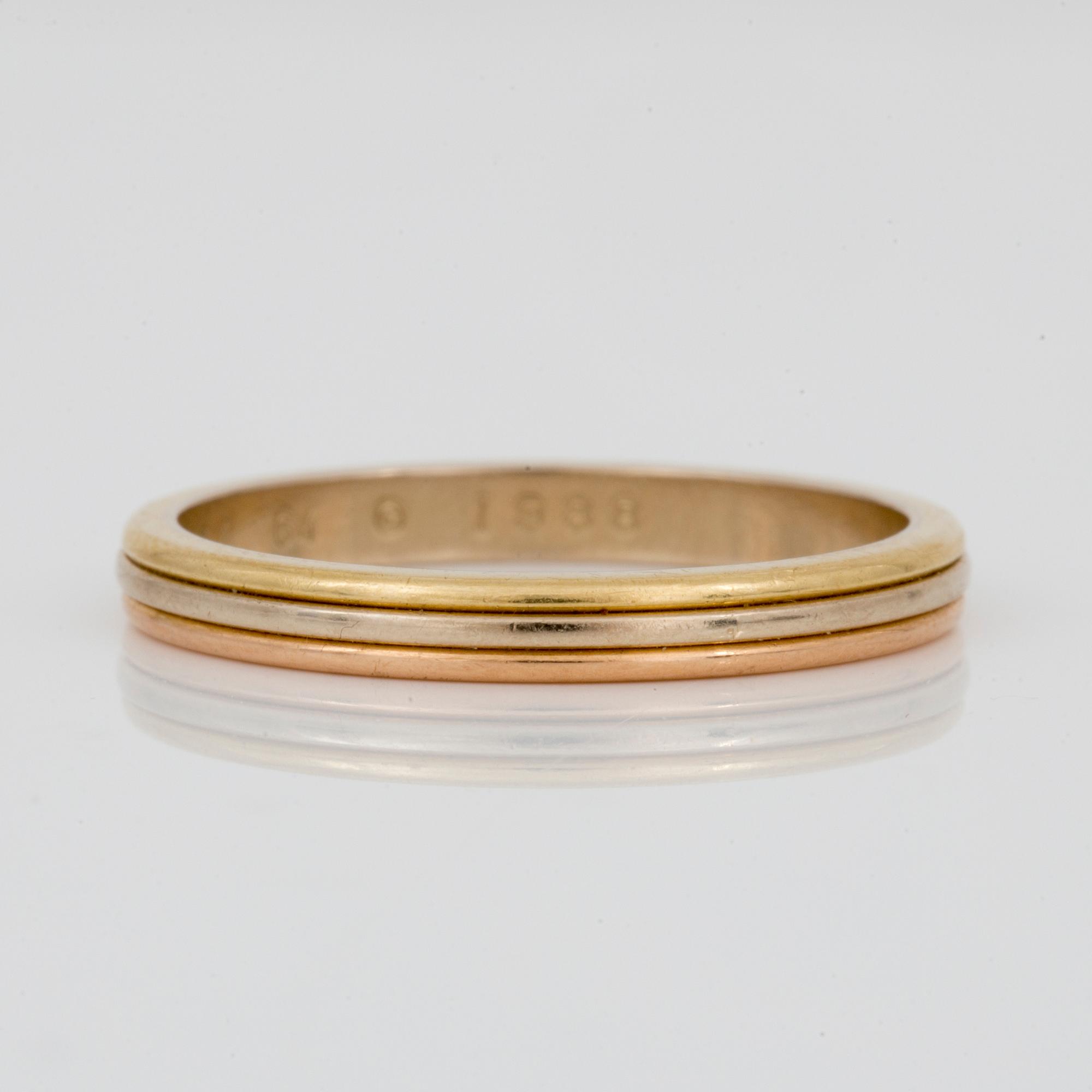 RING, Cartier, trefärgad 18K guld, daterad 1988.
