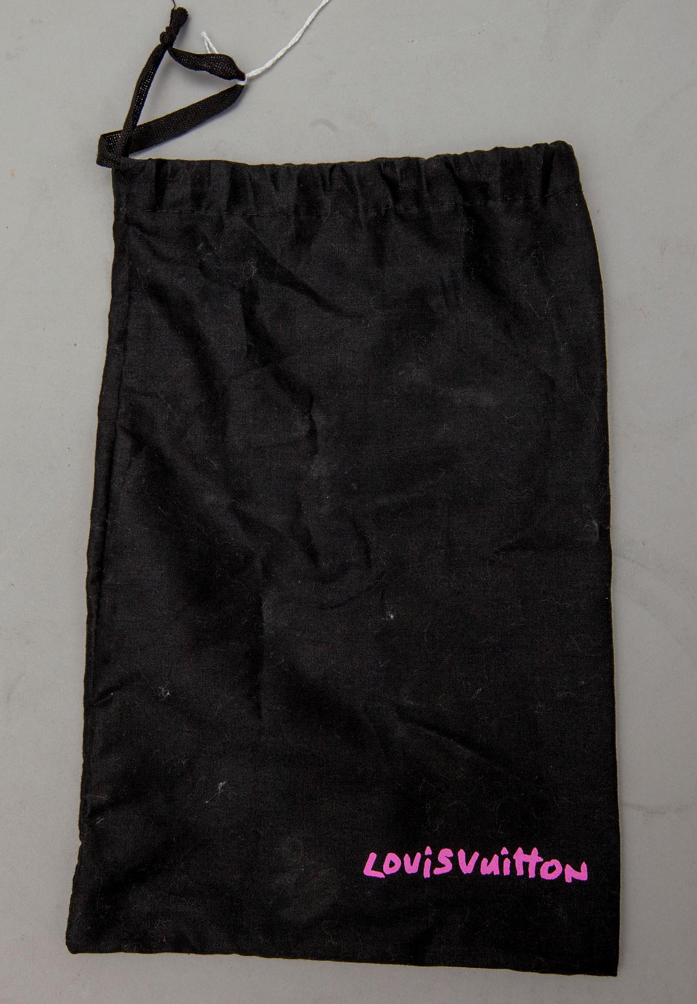 SJAL, Louis Vuitton.