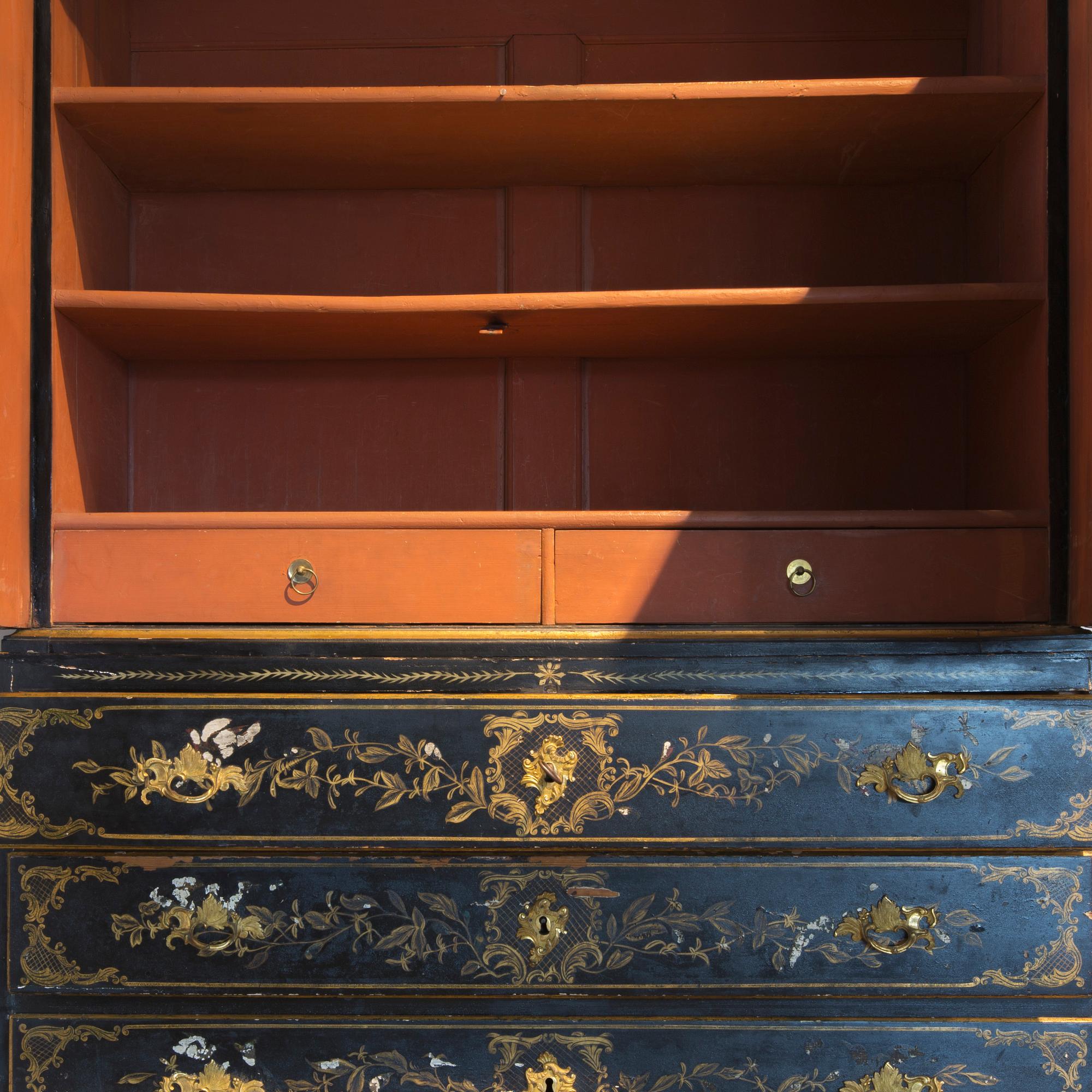 An early 18th century Chinese style cupboard.