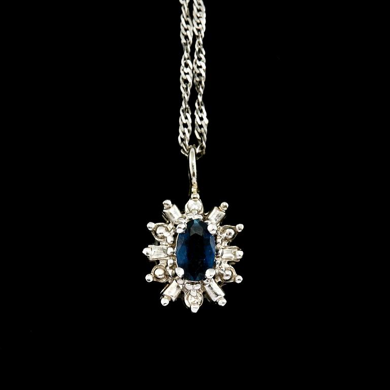 HÄNGE, 10 och14K vitguld med fasettslipad blå safir samt 2 åttkantslipade och 2 baguettslipade diamanter. Vikt 2,1 g.