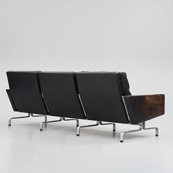 Poul Kjaerholm, a black leather PK31-3 sofa, edition E Kold Christensen, Denmark.