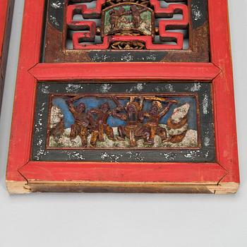 A pair of late Qing dynasty wooden panels, China, 19th/20th century.