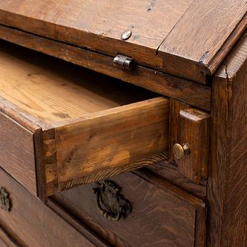 A mid 18th century oak secretaire.