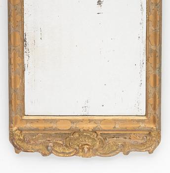 A Swedish rococo giltwood mirror, later part 18th century.