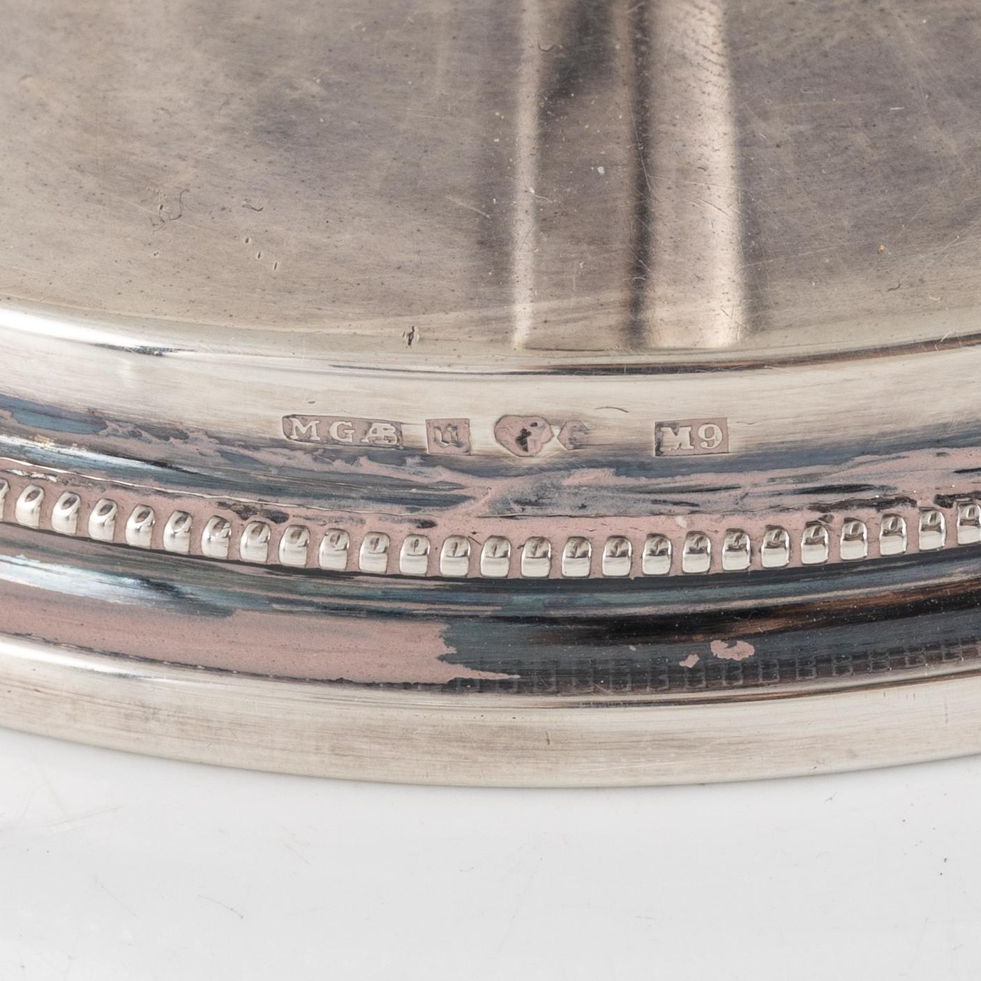 Eric Löfman, ljusstakar, två par, silver, MGAB, Uppsala, 1962 respektive 1976.