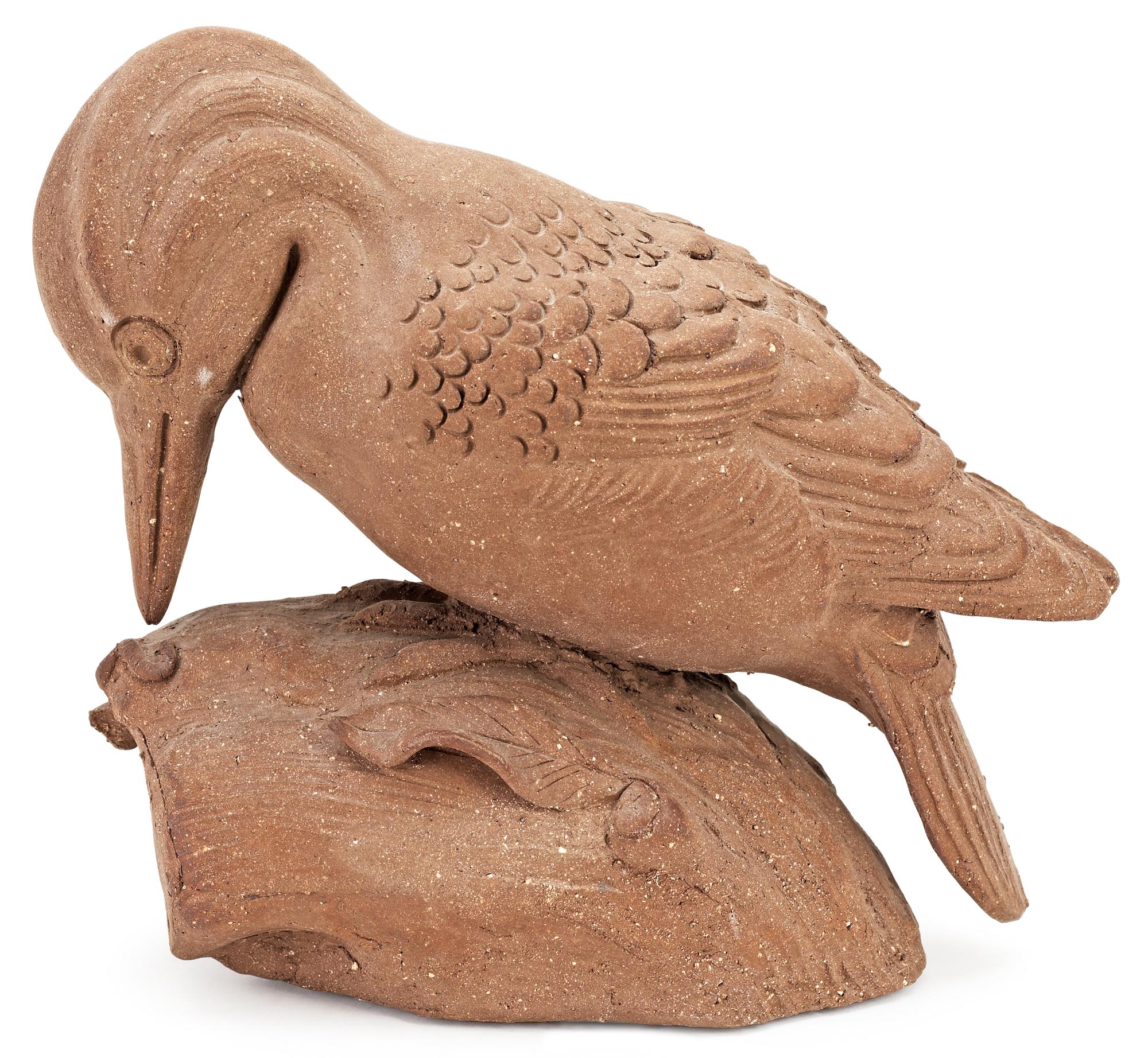 A Tyra Lundgren stoneware wood-pecker, signed with a seal.