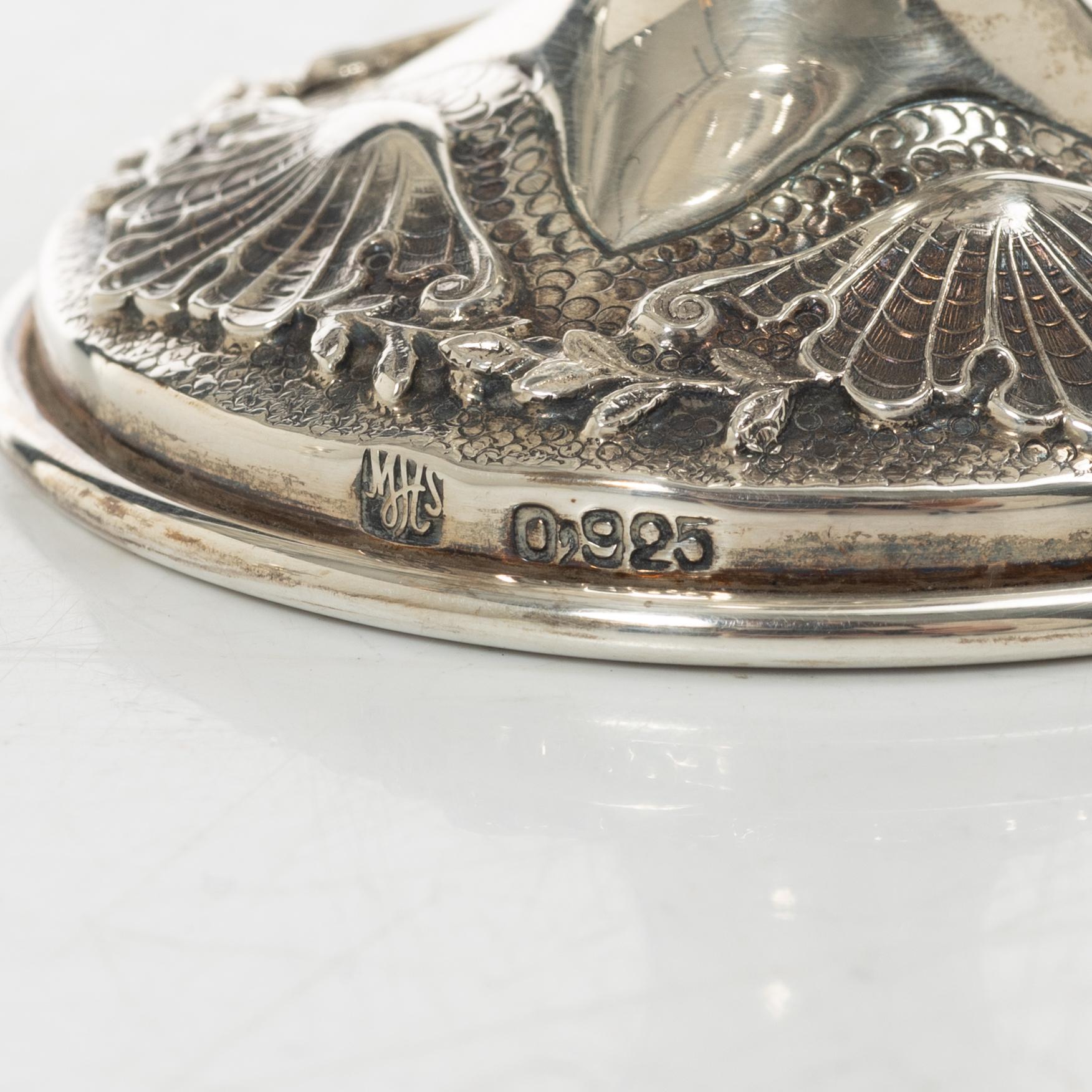 A par of  sterling silver goblets, Rococo style, 20th Century.