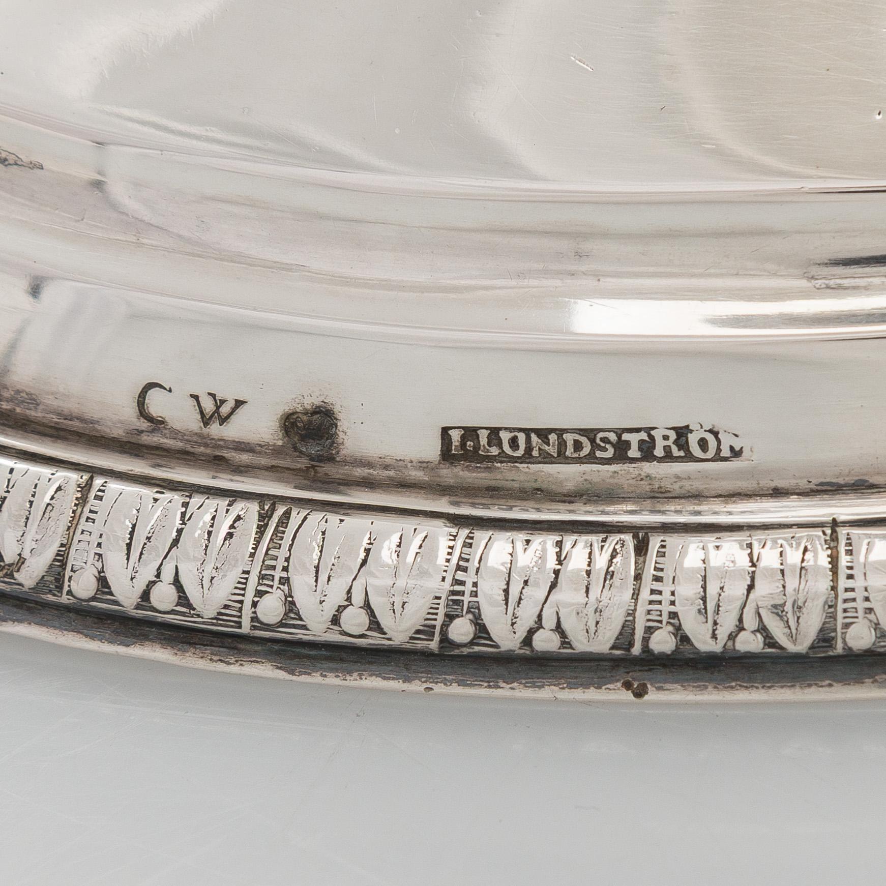 A pair of Empire silver candlesticks, maker's mark of Jacob Herman Lundström, Kuopio 1830.