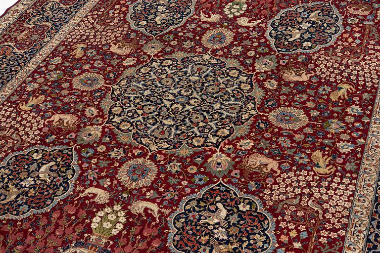 A semi-antique Benlian Tabriz carpet, signed Jabarzade, c. 416 x 308 cm.