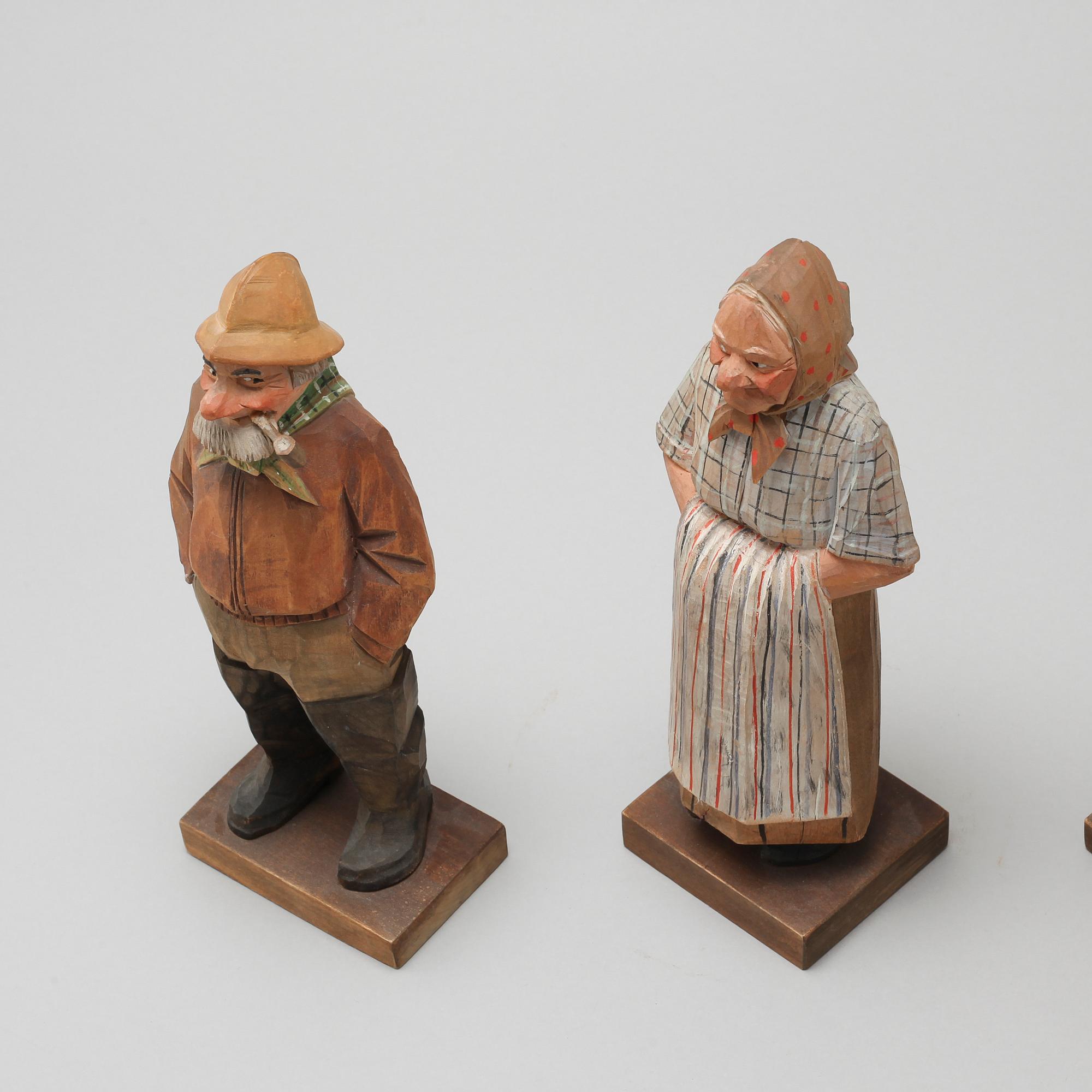 and CARL JOHAN TRYGG, three wooden sculptures, signed and dated, 1940s.