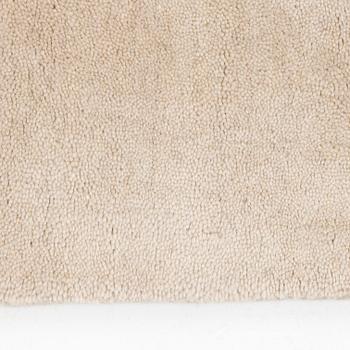 A hand tufted carpet, "Plain oatmeal" by Layered, ca 350 x 250 cm.