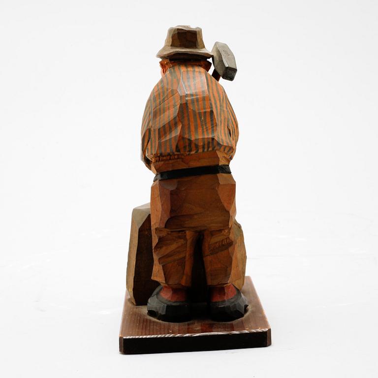 A signed wooden sculpture by CARL OLOF TRYGG.