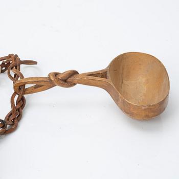 Half-horn knives, cup, bottle, needle case.