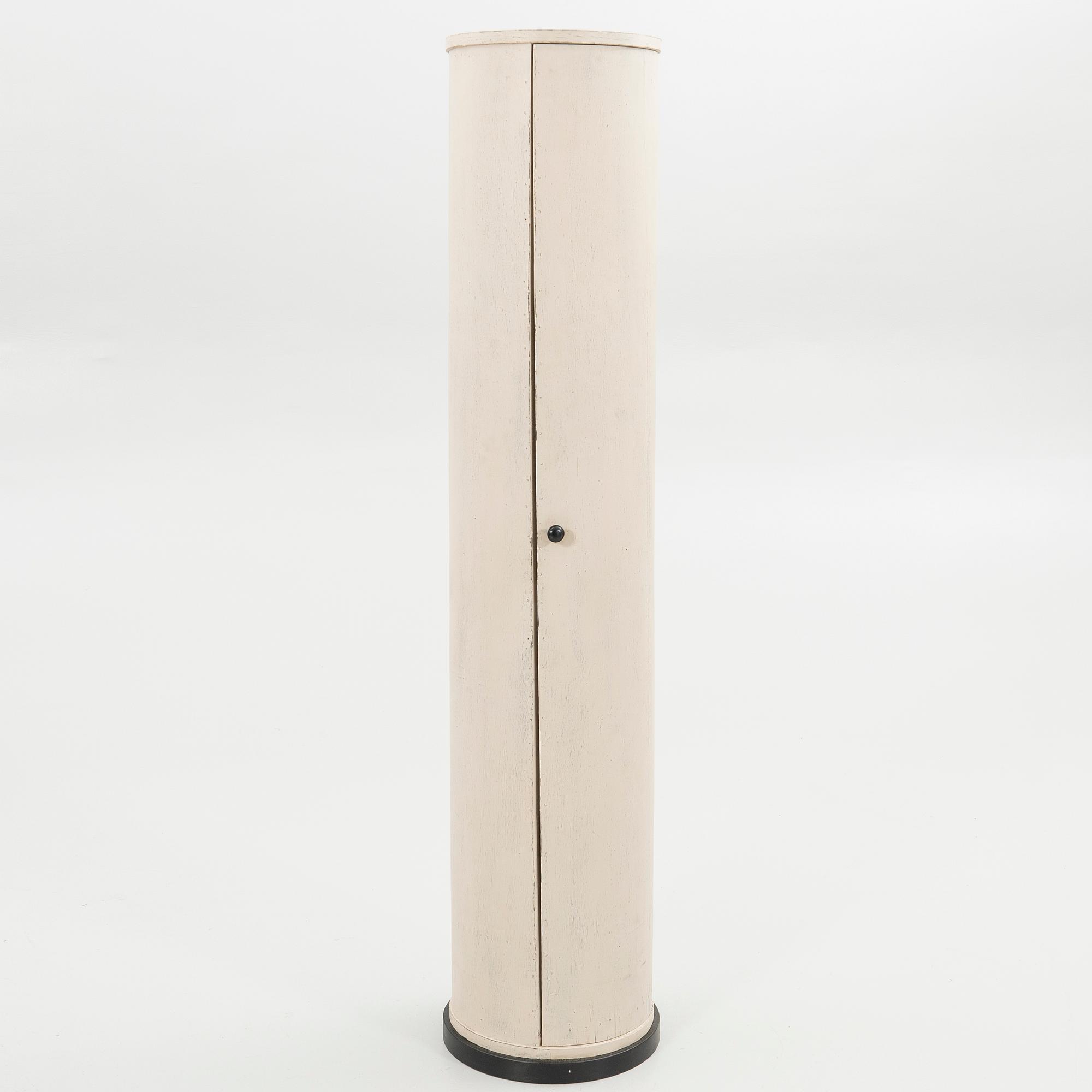 Column cabinet, first half of the 20th century.