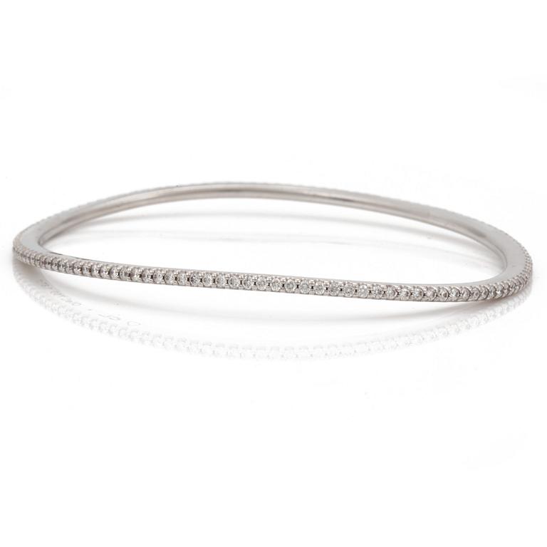 A brilliant cut diamond "Love bracelet" bangle by Ole Lynggard.