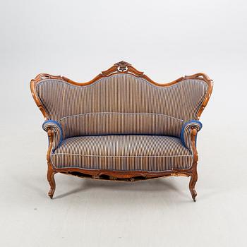 A Neo Rococo mahogany sofa later part of the 19th century.