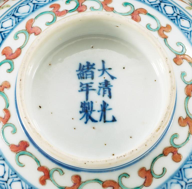 An enamelled bowl, late Qing dynasty, with Guangxu six character mark.