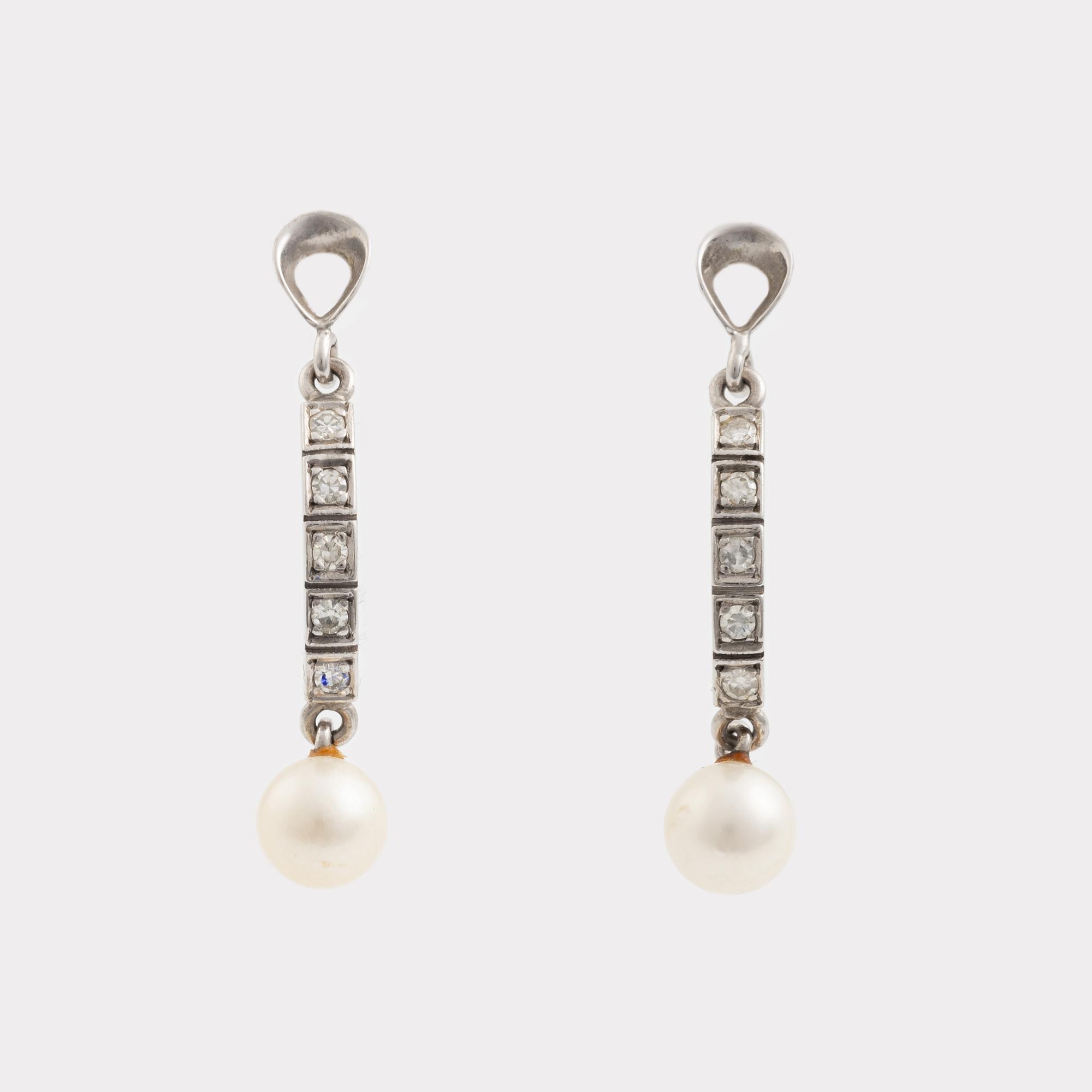 Necklace and earrings, a pair, cultured pearls, white gold, and brilliant- and octagon-cut diamonds.