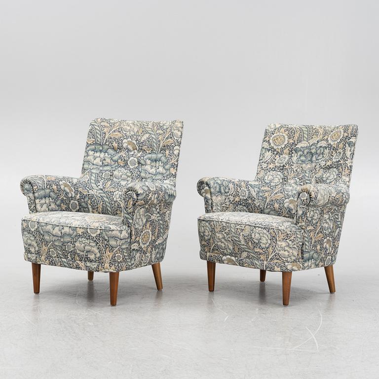 Carl Malmsten, a pair of Hemmakväll easy chairs .
