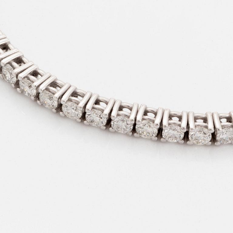 Brilliant-cut diamond tennis bracelet, with report HRD.