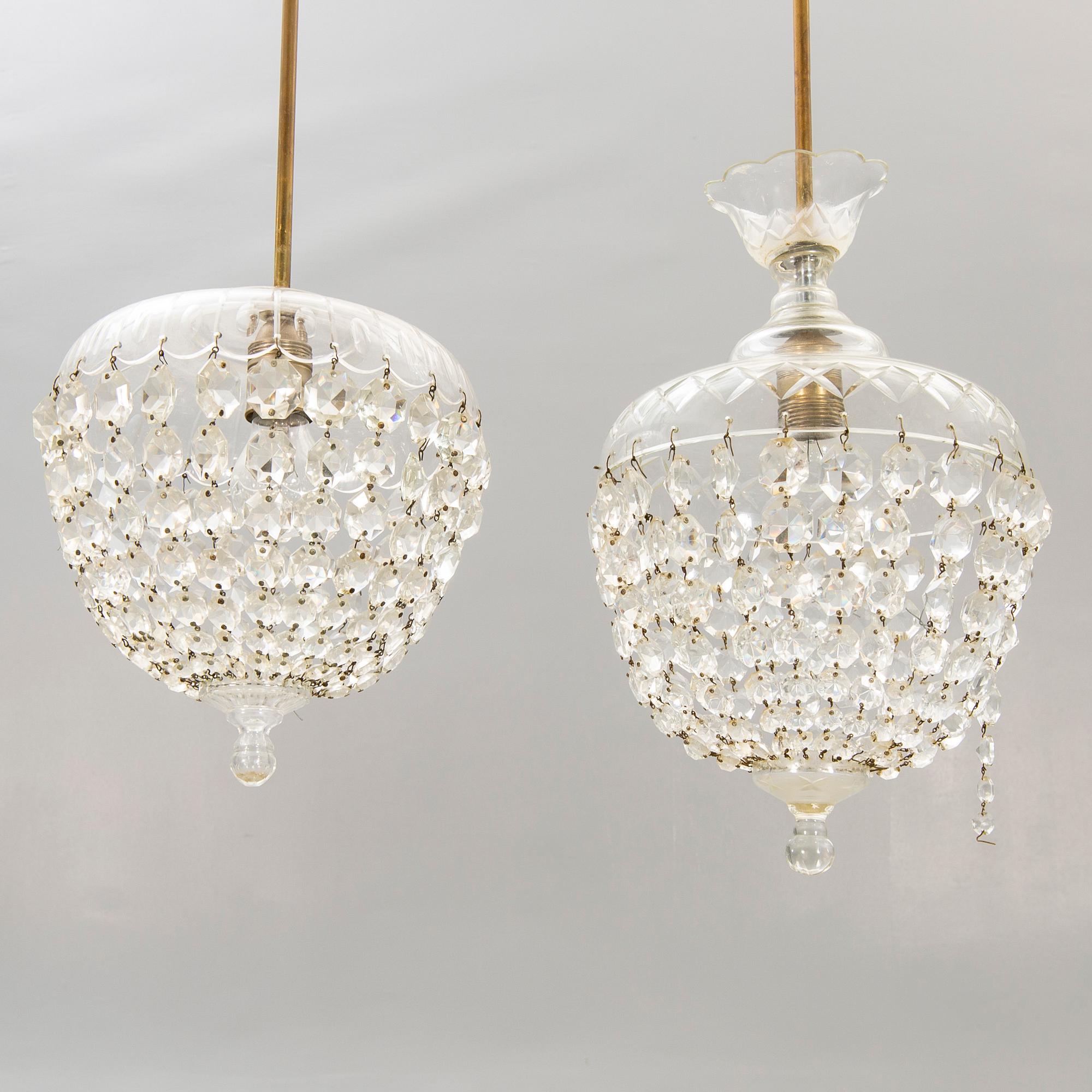 A pair of ceiling pendants around 1900.