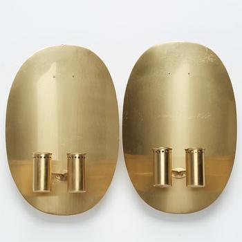 A pair of brass and glass wall sconces by Hans-Agne Jakobsson, Markaryd, second half of the 20th century.