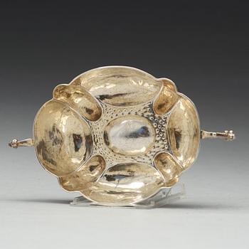 A German 17th century parcel-gilt silver brandy-bowl, unmarked, dated 1636.