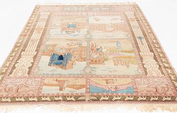 A semi-antique 'Four seasons' Tabriz carpet, ca 305 x 195 cm.