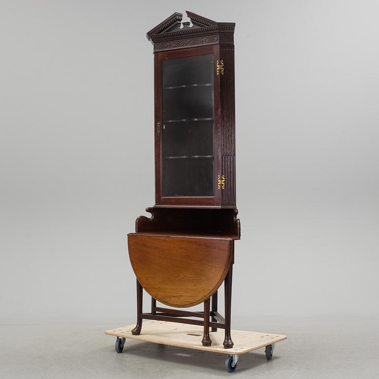 A 19th century table / corner cabinet.