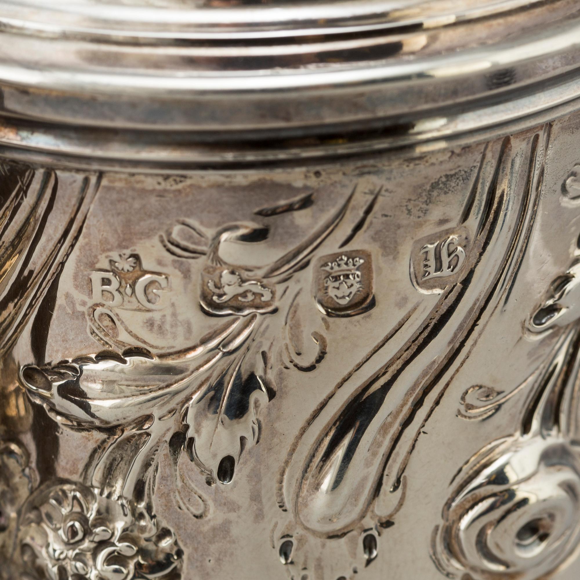 An English 18 th century silver coffee-pot, mark of Benjamin Gignac, London 1763.