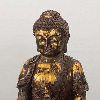 A Ming style gilded bronze Buddha.
