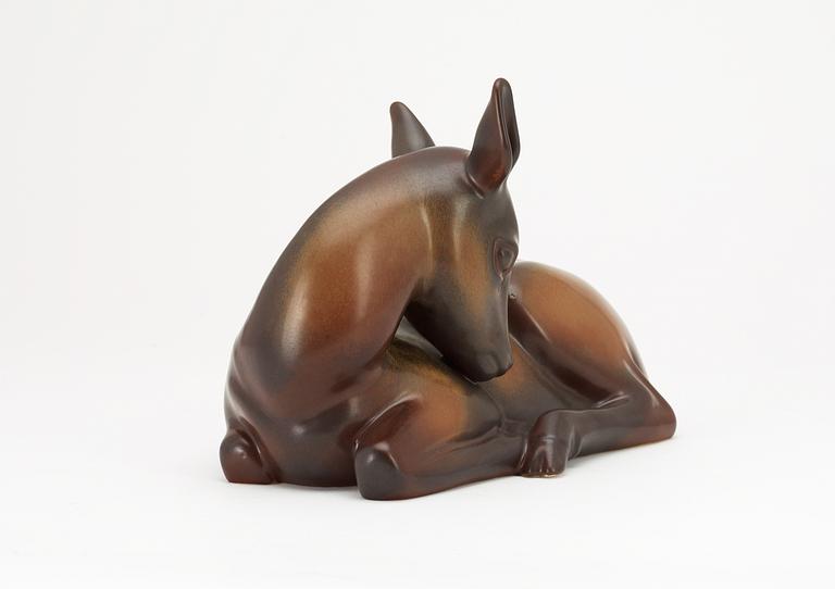 A Gunnar Nylund stoneware figure of a deer, Rörstrand.