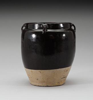A black glazed jar, presumably Song dynasty.