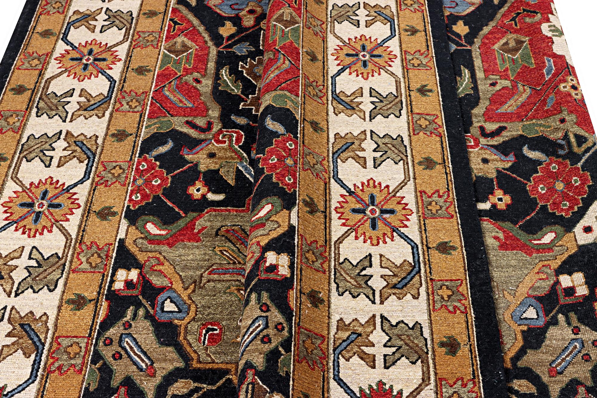 An oriental carpet with Mamluk design, c. 364 x 276 cm.
