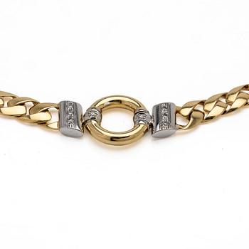 18K gold necklace with diamonds.