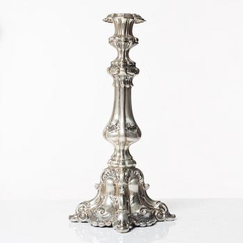 A Baroque style sterling silver altar candlestick, 20th Century.