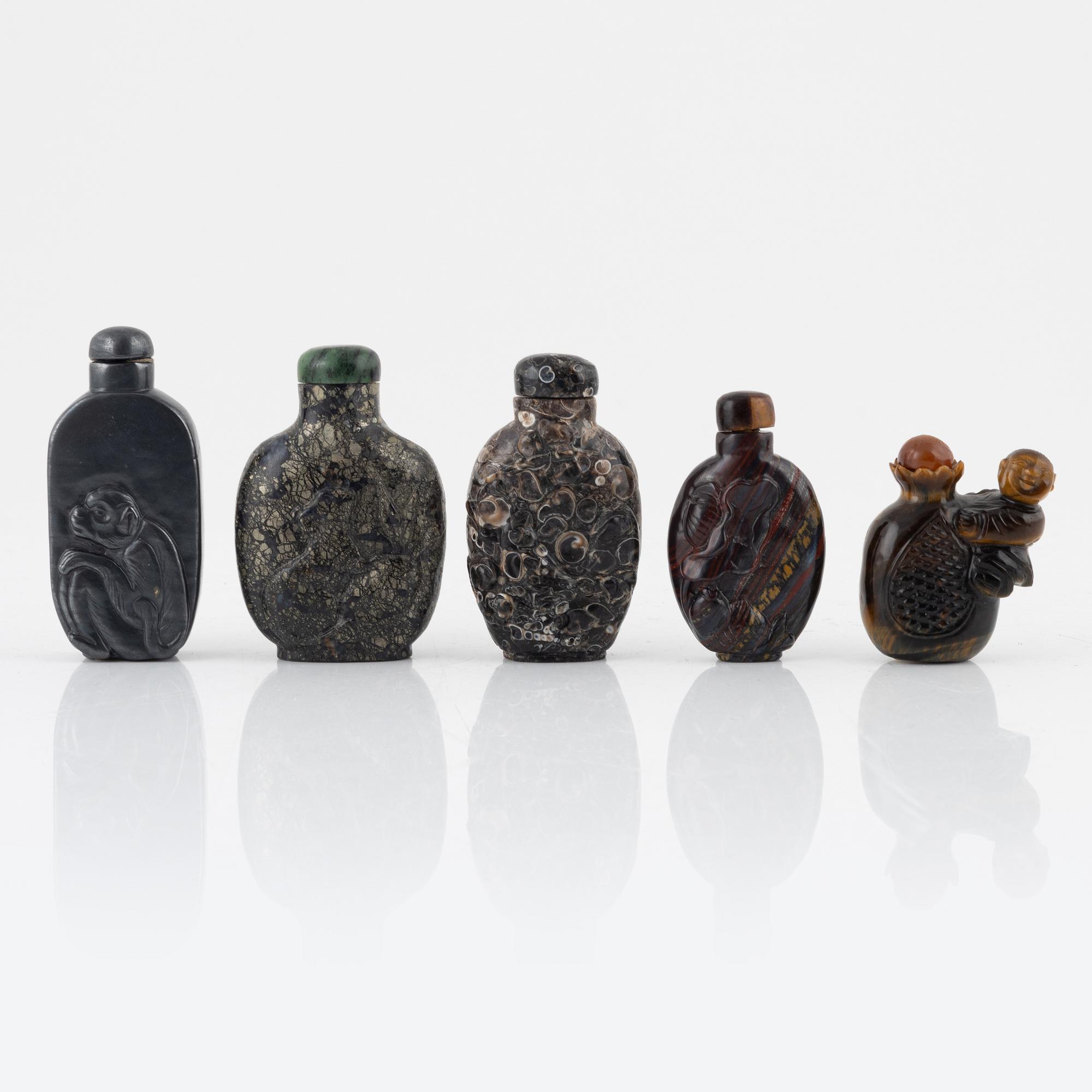 Ten snuff bottles, mottled stone, China, 20th century.