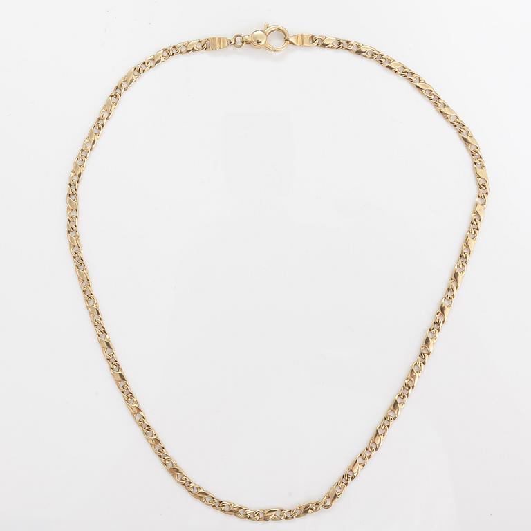 A 14K gold necklace.