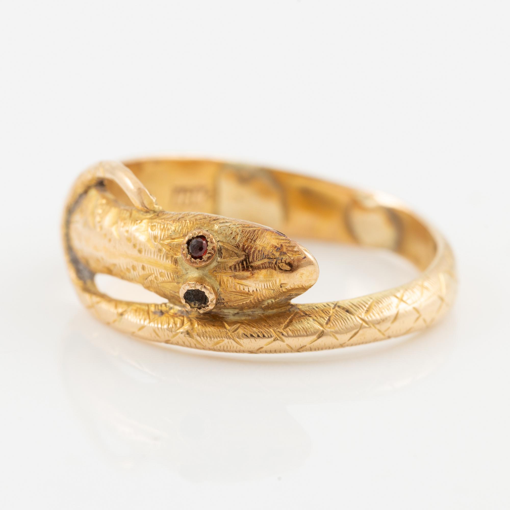 Ring, in the form of a serpent, 18K gold.