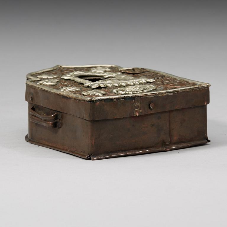 A gau amulet box with repousse worked front, Tibet, 19th Century.