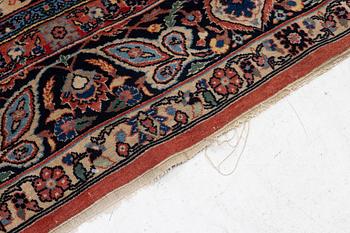 An oriental carpet, c. 370 x 275 cm.