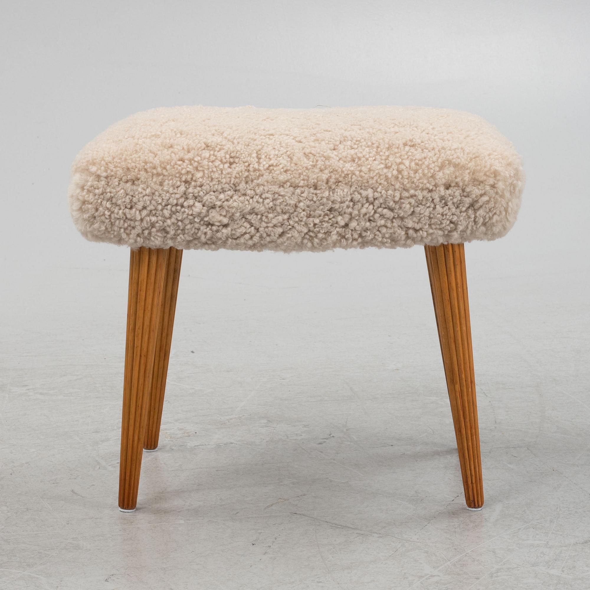 A sheepskin upholstered stool, mid 20th Century.