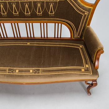 An eight piece Art Nouveau lounge suite in mahogany, Belgium/Netherlands, early 20th century.