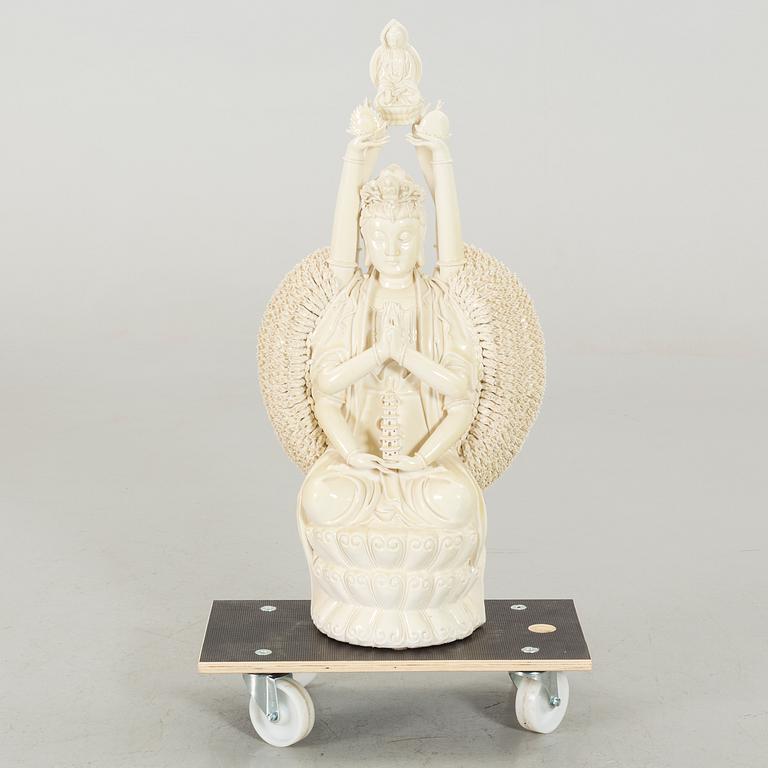 A porcelain figurin, late 20th century,