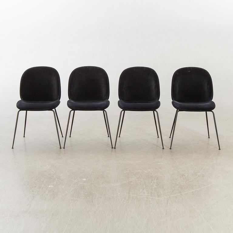A set of four Beetle dining chairs by Gamfratesi for Gubi 2013.
